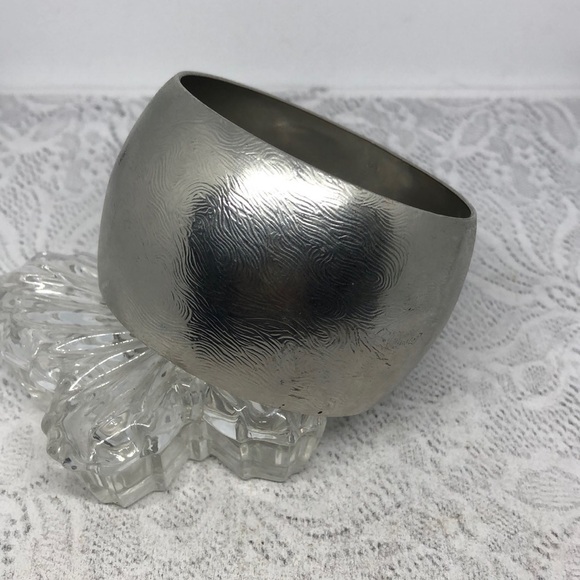 Express silver tone textured wide statement bangle bracelet. - Picture 1 of 6